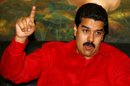 En la imagen un registro del vicepresidente de Venezuela, Nicolás Maduro, quien aseguró que "de buena fe" han invitado a los empresarios del sector de alimentos a dialogar y que algunos "han reaccionado positivamente", pero denunció que otros están en "jugaditas contra el pueblo". EFE/Archivo
