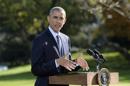 El presidente estadounidense, Barack Obama, efectúa una breve comparecencia ante la prensa en la Casa Blanca en Washington DC, Estados Unidos, antes de viajar a Wisconsin. EFE