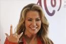 La cantante Anastacia que, superados sus problemas de salud, intenta recuperar el tiempo perdido en la carrera de las divas pop con un nuevo disco de temas inéditos, "Resurrection", durante la presentación del mismo hoy en Madrid. EFE