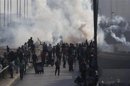 TESTIGO-Caos y sangre tras el asalto al campamento de protesta egipcio
