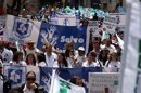 Manifestantes participan, este 19 de julio, en una marcha para exigir una adecuada cobertura sanitaria y denunciar las irregularidades detectadas en varias Empresas Promotoras de Salud Subsidiada (EPS). EFE