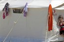 Una pequeña refugiada siria en un campamento montado por la Media Luna Roja. EFE/Archivo