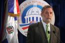 Fotografía tomada en febrero de 2013 en la que se registró al portavoz de la Presidencia dominicana, Roberto Rodríguez-Marchena, quien destacó que las investigaciones estarán a cargo de una comisión de alto nivel que deberá rendir un informe al Ejecutivo "en el menor tiempo posible". EFE/Archivo